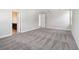 Bright bedroom featuring neutral tones, carpet flooring, and ample natural light at 2206 N Boulevard, Tampa, FL 33602