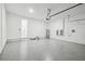 Bright, organized garage with epoxy flooring, water heater, and ample space at 2206 N Boulevard, Tampa, FL 33602