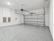 Spacious, clean garage featuring an epoxy floor and an automatic door at 2206 N Boulevard, Tampa, FL 33602
