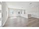 Well-lit upstairs hallway featuring hardwood floors and neutral paint tones throughout at 2206 N Boulevard, Tampa, FL 33602