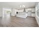 Spacious open-concept living room and kitchen with modern island and stainless steel appliances at 2206 N Boulevard, Tampa, FL 33602