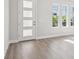 Bright living room showcasing hardwood floors and windows at 2206 N Boulevard, Tampa, FL 33602