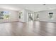 Bright living room with wood-look flooring, and multiple windows at 2206 N Boulevard, Tampa, FL 33602