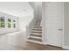Open-concept living space featuring modern staircase at 2206 N Boulevard, Tampa, FL 33602