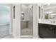 Elegant bathroom with walk-in shower, tiled walls, and modern fixtures at 2206 N Boulevard, Tampa, FL 33602