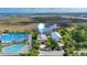 Waterfront home with a screened pool and marsh views for serene coastal living at 4031 Eagle Nest Dr, Hernando Beach, FL 34607
