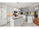 Modern kitchen with island, granite countertops and stainless steel appliances at 15019 Southfork Dr, Tampa, FL 33624