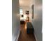 Simple bedroom with a view down a hallway at 1411 E Powhatan Ave, Tampa, FL 33604