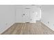 Bright living room with laminate wood flooring at 9009 Westchester Cir # B-18, Tampa, FL 33604