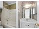 Bathroom with a bathtub, shower, and vanity at 9009 Westchester Cir # B-18, Tampa, FL 33604