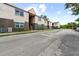 Side view of a two-story apartment building with brick and stucco at 9009 Westchester Cir # B-18, Tampa, FL 33604