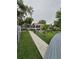 Landscaped backyard with gazebo and walkway to dock at 6404 Land O Lakes Blvd., Land O Lakes, FL 34638