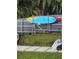 Colorful paddleboard stored on a rack in the backyard at 6404 Land O Lakes Blvd., Land O Lakes, FL 34638