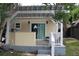 Outdoor patio area with pergola, grill, and sliding door access at 6404 Land O Lakes Blvd., Land O Lakes, FL 34638