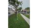 Landscaped pathway leading to a waterfront property at 6404 Land O Lakes Blvd., Land O Lakes, FL 34638