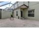 Private patio with screened enclosure at 14175 Stilton St, Tampa, FL 33626