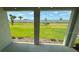 Covered back porch offering views of the backyard at 18204 Beach Ranch Ter, Lakewood Ranch, FL 34211