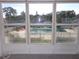 Enjoy refreshing pool views from this relaxing sunroom at 1433 S Belcher Rd # A9, Clearwater, FL 33764