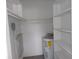 Storage closet with shelving and water heater at 1433 S Belcher Rd # A8, Clearwater, FL 33764