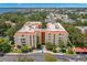 Aerial view of condo building with water views at 2630 Pearce Dr # 404, Clearwater, FL 33764