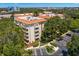 Aerial view of condo building and parking at 2630 Pearce Dr # 404, Clearwater, FL 33764