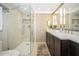 Modern bathroom with double vanity, large shower, and updated fixtures at 2630 Pearce Dr # 404, Clearwater, FL 33764