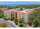 Aerial view of a condo building near the water at 2630 Pearce Dr # 404, Clearwater, FL 33764