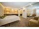 Bright bedroom with mirrored closet doors and plush carpeting at 2630 Pearce Dr # 404, Clearwater, FL 33764