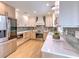 Modern kitchen with stainless steel appliances and light wood cabinets at 4608 Holbrook Rd, Plant City, FL 33565