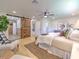 Spacious main bedroom with barn door and ensuite bathroom at 4608 Holbrook Rd, Plant City, FL 33565
