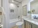 Bathroom with a bathtub, toilet, vanity, and shower at 4608 Holbrook Rd, Plant City, FL 33565
