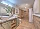 Spa-like bathroom with walk-in shower and wood-look tile at 4608 Holbrook Rd, Plant City, FL 33565