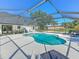 Inviting pool area with screened enclosure, lounge chairs, and ample space for relaxation at 4608 Holbrook Rd, Plant City, FL 33565
