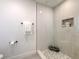 Modern shower with pebble flooring and glass enclosure at 4608 Holbrook Rd, Plant City, FL 33565
