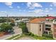 Exterior view of a residential building with a tiled roof at 2331 W Horatio St # 610, Tampa, FL 33609