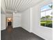 Spacious bedroom with dark tile floors and large window at 2331 W Horatio St # 610, Tampa, FL 33609