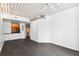 Spacious living room with dark gray tile floors and high ceilings at 2331 W Horatio St # 610, Tampa, FL 33609