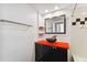 Small bathroom with a black vanity and vessel sink at 2331 W Horatio St # 610, Tampa, FL 33609