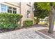 Building exterior with landscaping and walkway at 2331 W Horatio St # 610, Tampa, FL 33609