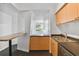 Modern kitchen features stainless steel appliances and dark countertops at 2331 W Horatio St # 610, Tampa, FL 33609