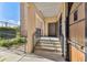 Ground-level view of building entrance with steps and ramp access at 2331 W Horatio St # 610, Tampa, FL 33609