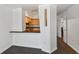 Modern kitchen with breakfast bar and dark countertops at 2331 W Horatio St # 610, Tampa, FL 33609