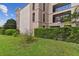Building exterior with landscaping and green space at 2331 W Horatio St # 610, Tampa, FL 33609