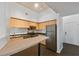 Modern kitchen with stainless steel appliances and a breakfast bar at 2331 W Horatio St # 610, Tampa, FL 33609