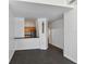 Living room with dark tile floors and kitchen bar at 2331 W Horatio St # 610, Tampa, FL 33609