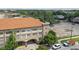 Aerial view of a building complex with parking and surrounding cityscape at 2331 W Horatio St # 610, Tampa, FL 33609