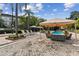 Relaxing pool area with shaded seating and lounge chairs at 2331 W Horatio St # 610, Tampa, FL 33609