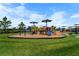 The community playground offers fun activities for children to enjoy at 10744 Hawks Landing Dr, Land O Lakes, FL 34638