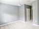 Spacious bedroom with gray walls and carpet at 6410 Cypressdale Dr # 201, Riverview, FL 33578
