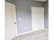 Spacious bedroom with neutral walls and carpet at 6410 Cypressdale Dr # 201, Riverview, FL 33578
